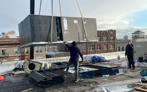 Crane installation of a rooftop unit